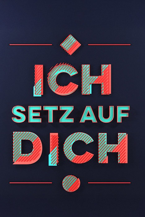 Bold poster with German text 'ICH SETZ AUF DICH' in red and teal on a dark blue background
